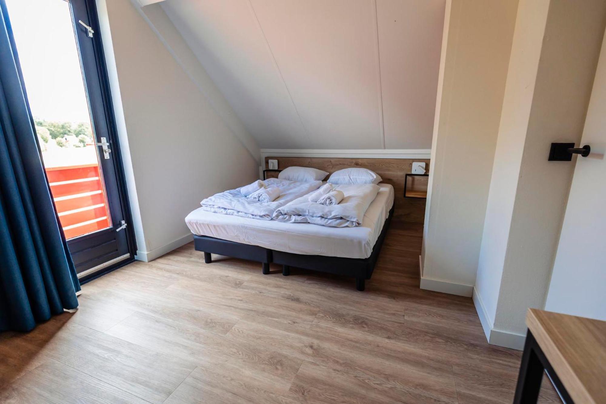 Vakantiepark 'T Broeckhuys Hotel Ewijk Szoba fotó